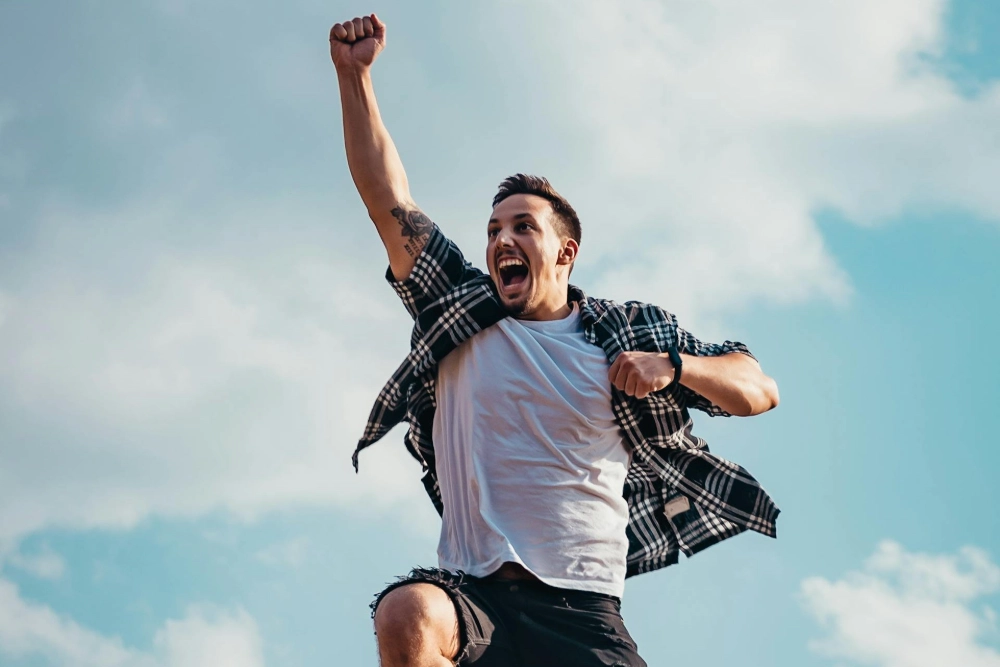 happy man flying clynt